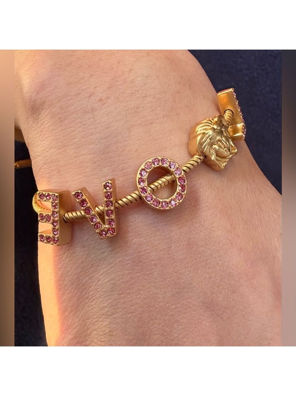702. “LOVE” Gold Tone and Pink Crystals With Medusa Charm Bracelet